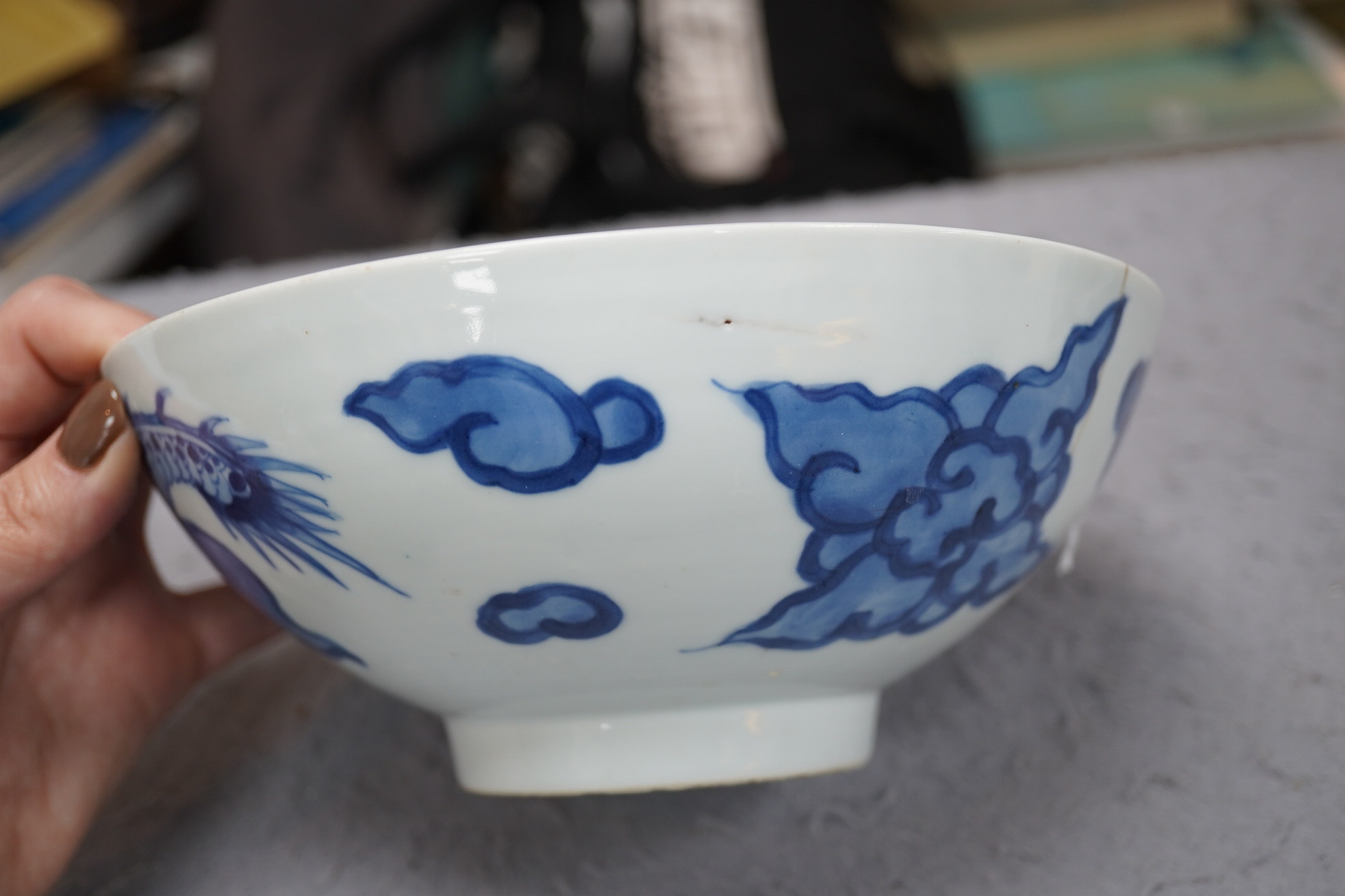 A Chinese blue and white ‘cloud and dragon’ bowl, Yongzheng mark and period (1723-35)